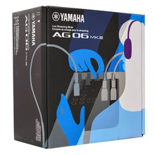 Load image into Gallery viewer, Yamaha AG06 MK2 Live Streaming Mixer retail packaging box, featuring a black and blue design with an illustration of a person using a mixing console and headphones.