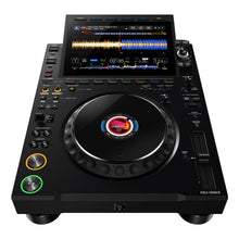 Load image into Gallery viewer, Birds eye view of AlphaTheta Pioneer CDJ-3000X professional DJ media player, showing large 9-inch touchscreen display with waveforms, jog wheel, cue and play buttons, and full performance controls for club DJs