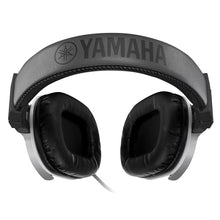 Load image into Gallery viewer, Yamaha over-ear headphones in black and gray, featuring padded ear cups and a wide headband with the YAMAHA logo, shown on a plain white background.
