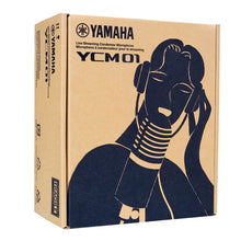 Load image into Gallery viewer, Yamaha YCM01 live streaming condenser microphone retail box in brown cardboard with a dark graphic of a person wearing headphones and speaking into a microphone.